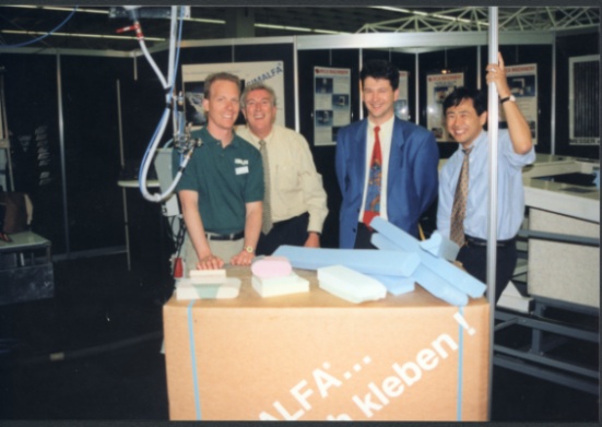 Group of people at a trade exhibition