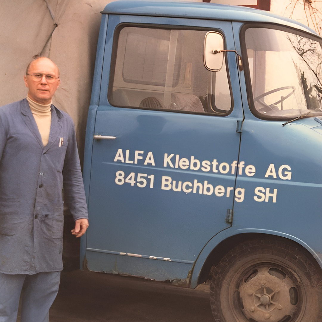 Man standing next to ALFA Klebstoffe truck